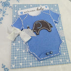 In Stitches: Baby Onesie Die